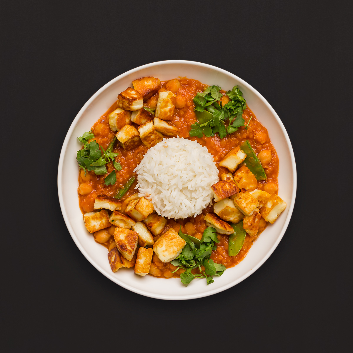 Rotes Linsencurry mit Zuckerschoten und gebratenem Halloumi Rezept ...